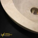 Round Design Washbasin With Travertine Tap Outlet